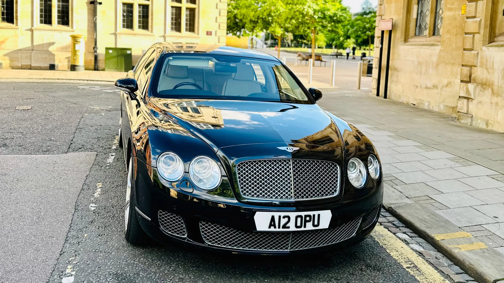 Front view of Modern Bentley Flying Spur in the stree of Northampton