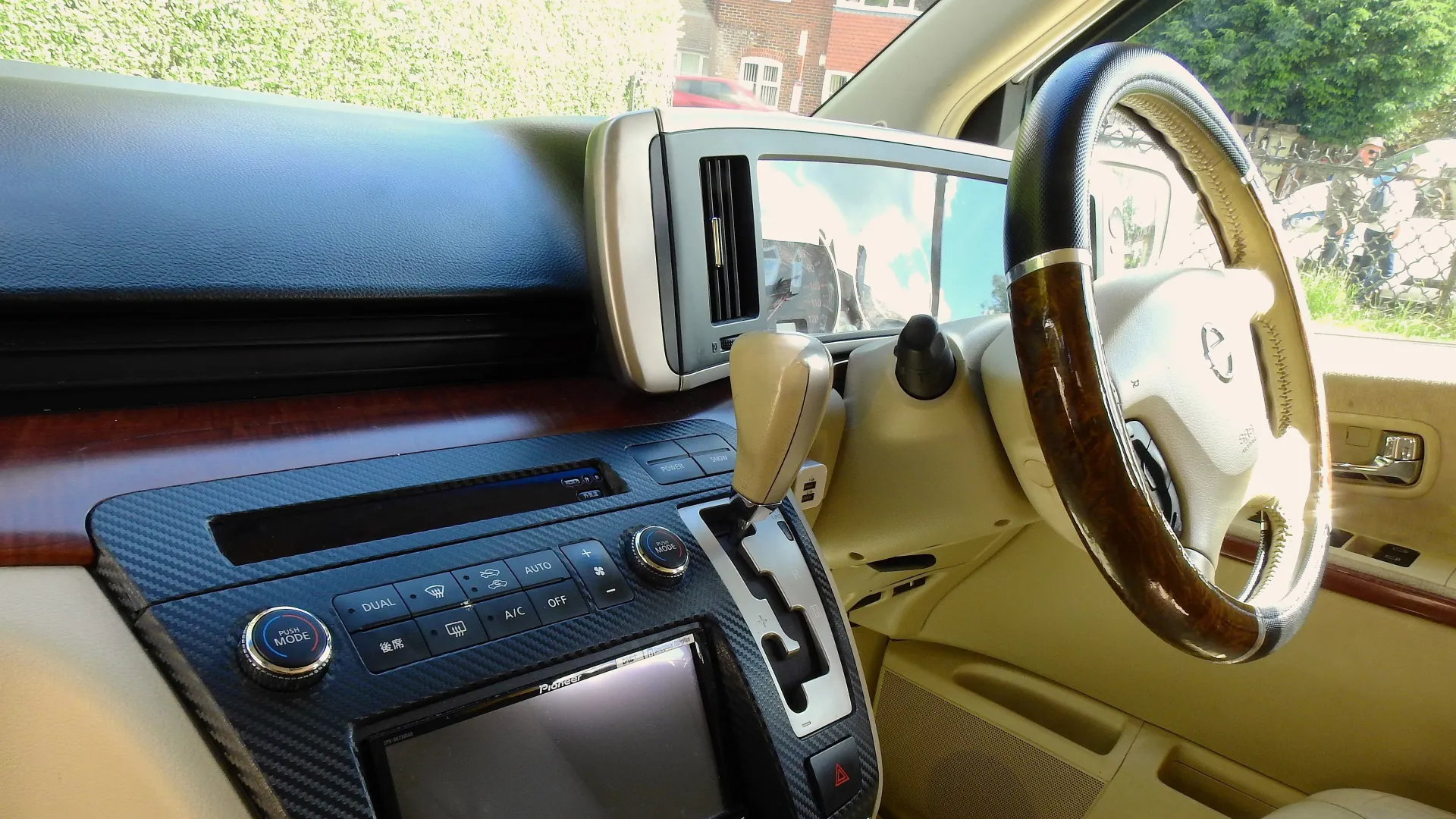 Front Driver seat with wooden steering wheel