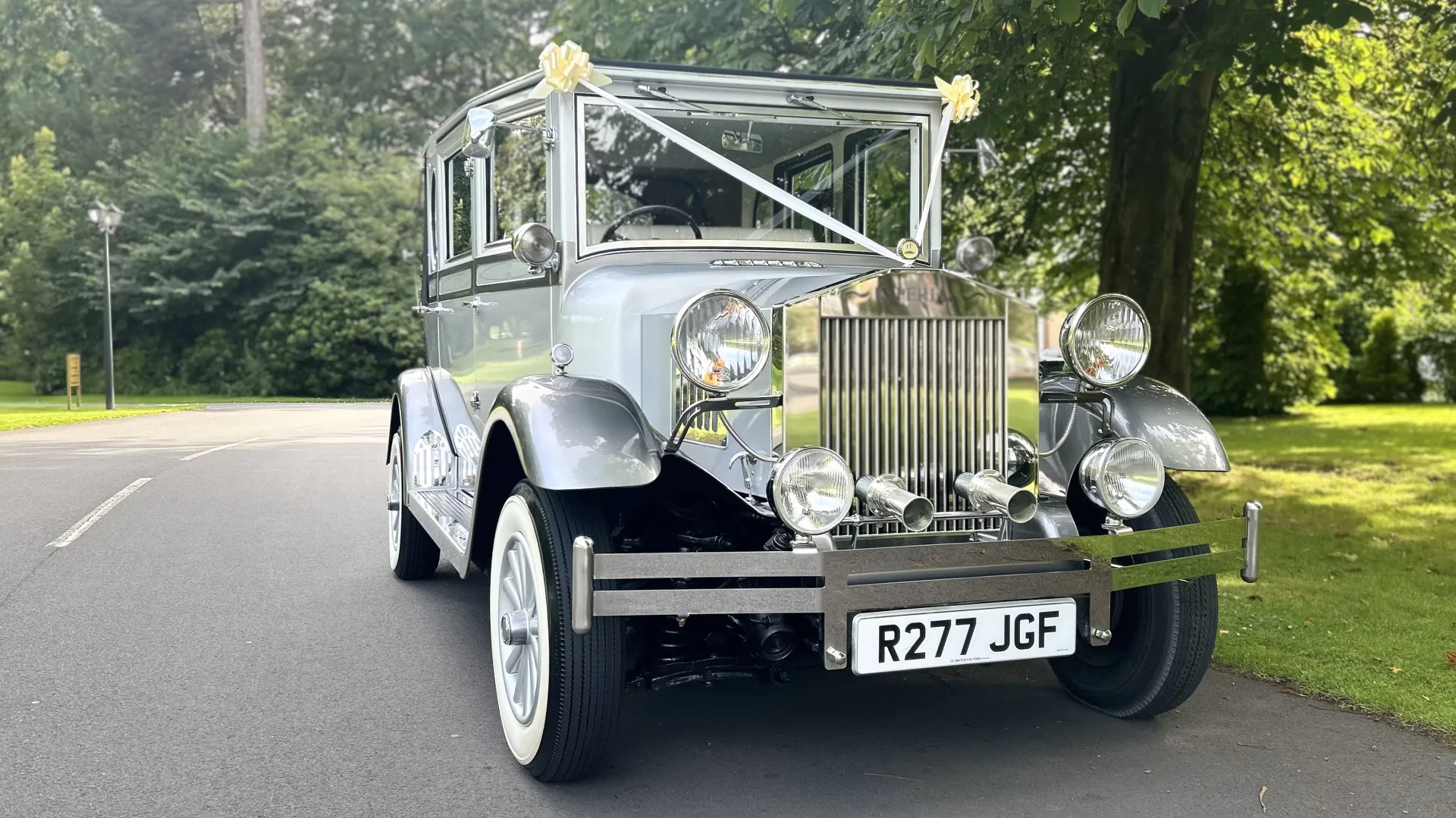 Front view of Imperial car showing the long chrome grill and vintage style light