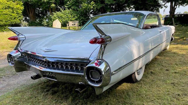 rear view of Classic American Cadillac with large chrome bumpers