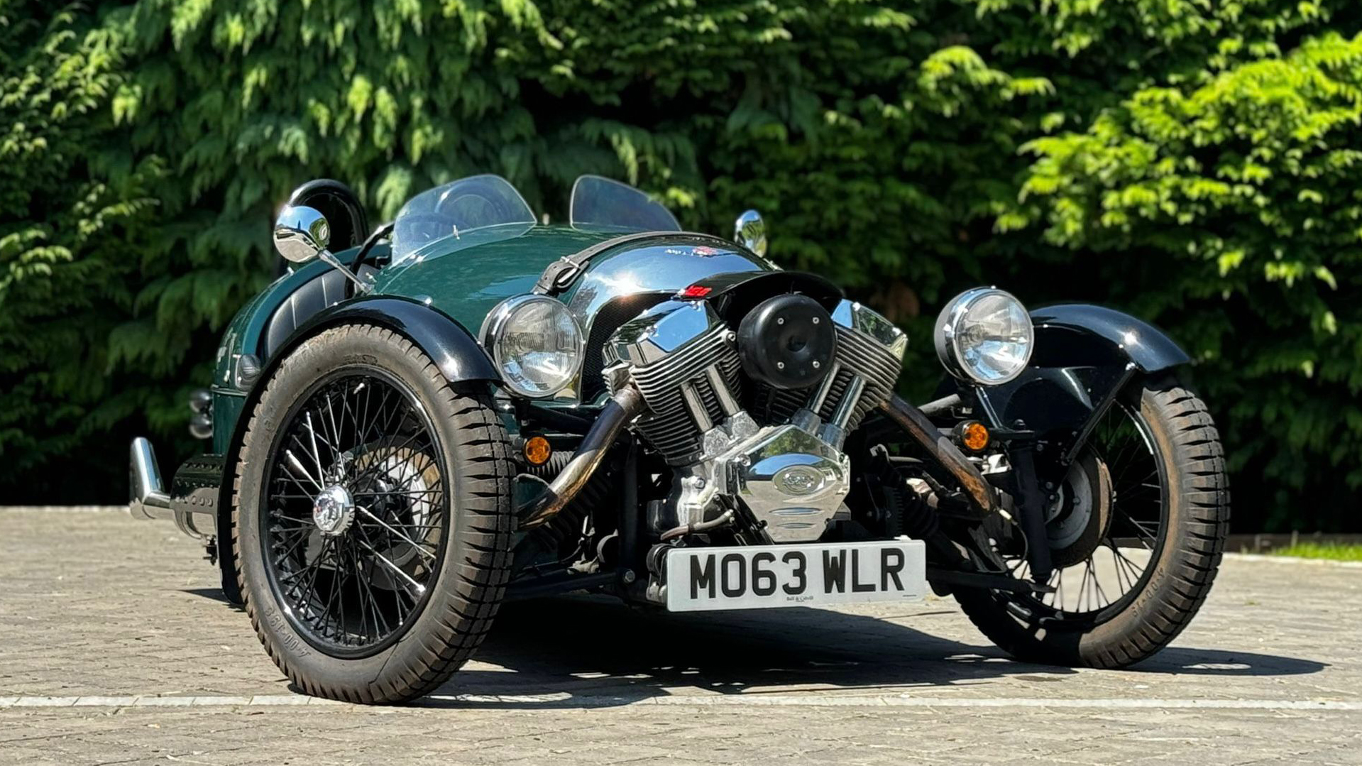 Front view of Morgan 3-wheeler in British racing green