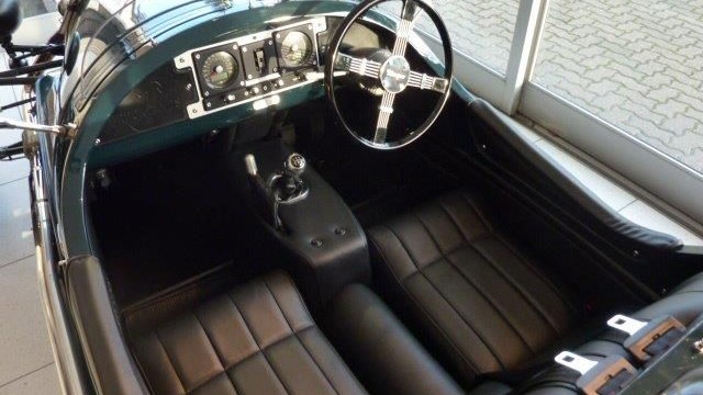 interior photo of Morgan with black leather seats