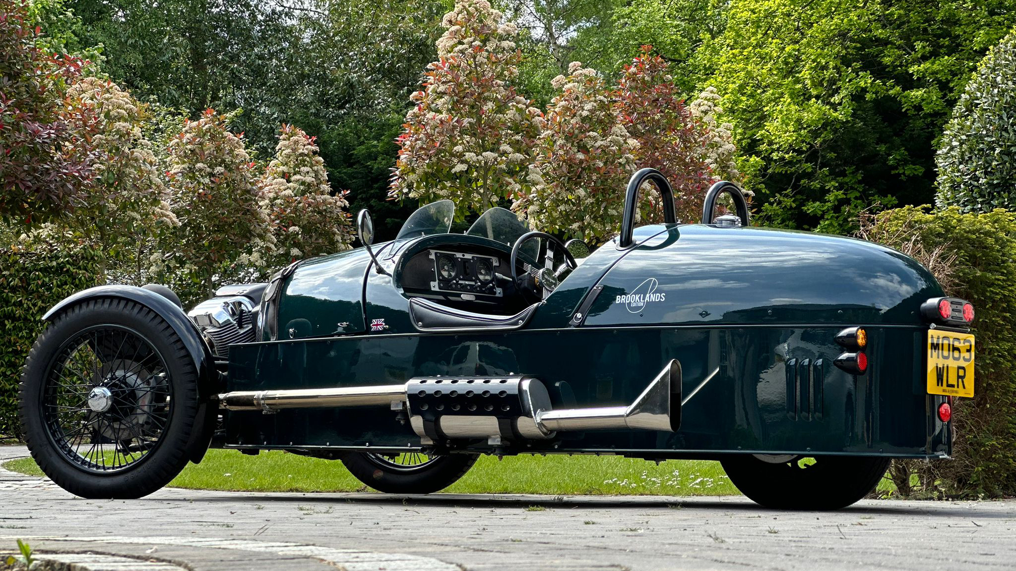 Side view of Morgan showing the 3 wheels, 2 at the front and 1 at the rear