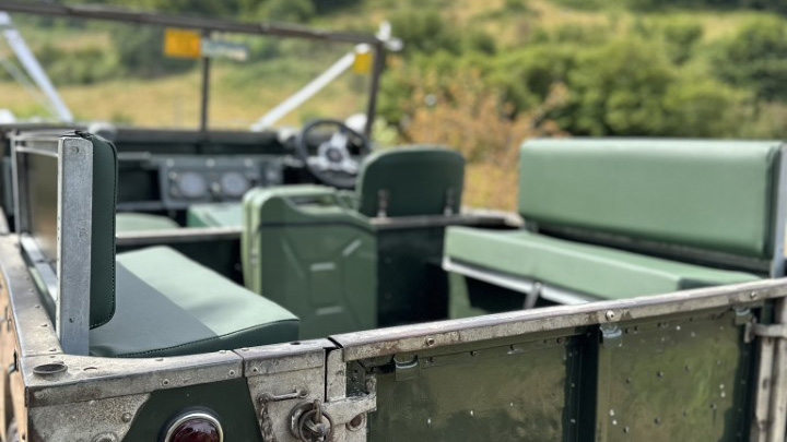 Rear interior seating in Army Green Landrover Series 1 from the late 1950s.