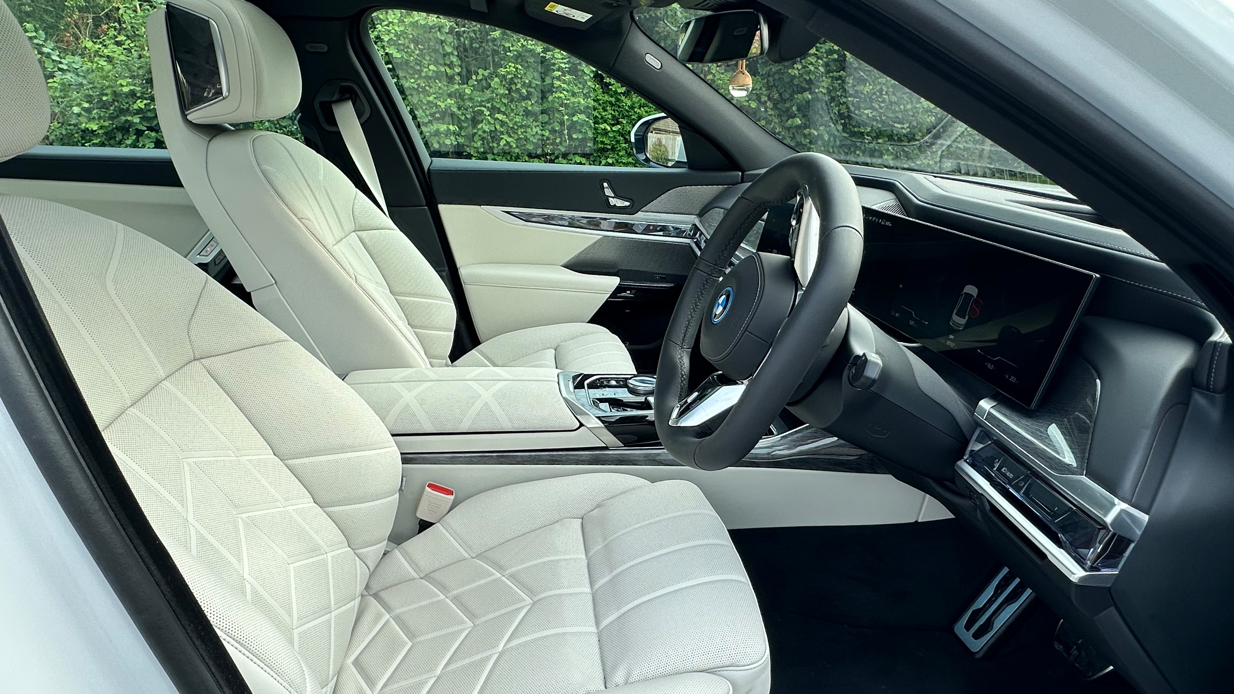 Front interior view of BMW 
i7. Cream Leather interior.