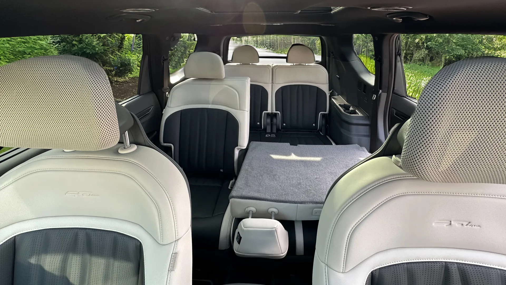 interior of Kia SUV with cream seats