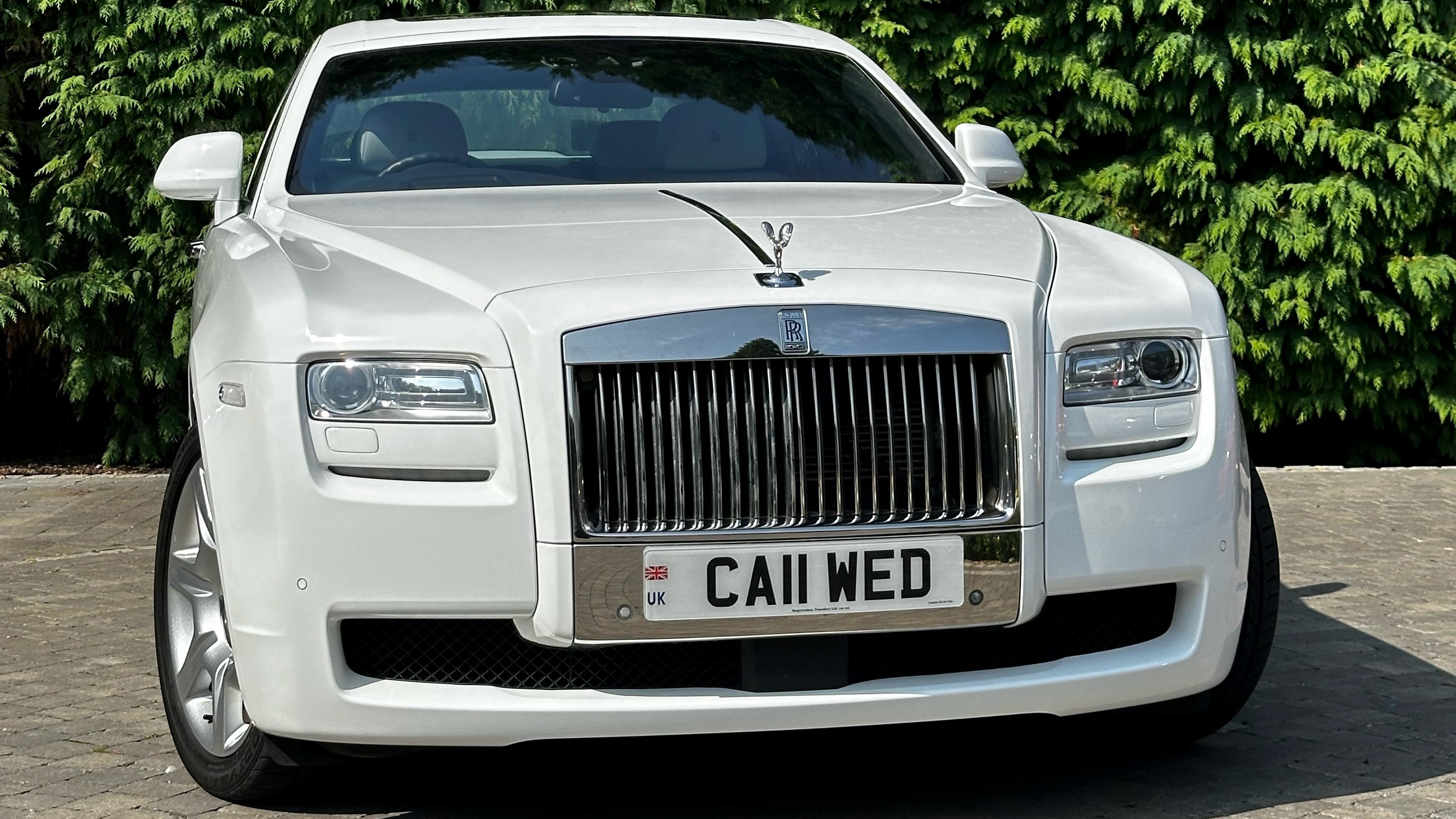 White Rolls-Royce Ghost front view showing chrome grill