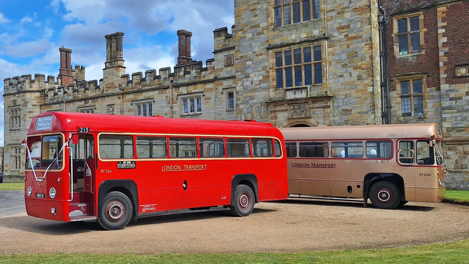 Two Single Decker buses parked in front of a wedding venue. Bus on the left is Red and the one on the right is Gold