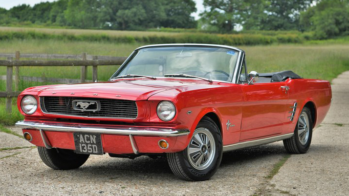 Left front view of Red convertible mustang