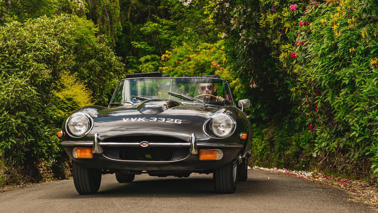 Front view Jaguar E-type with convertible roof down