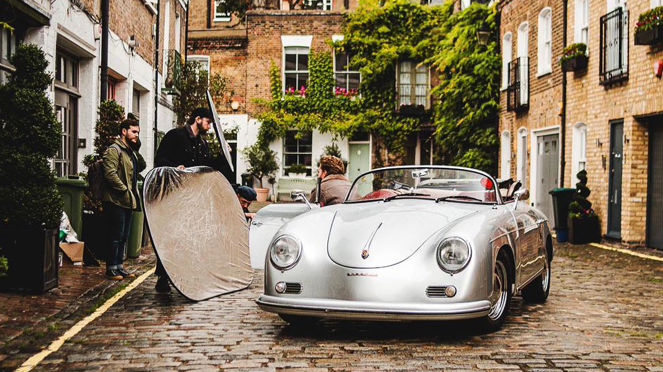 Classic Porsche 356 convertible on a TV set in the street of London