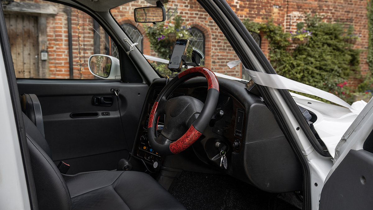 Front seating area inside a TX4 Taxi Cab.