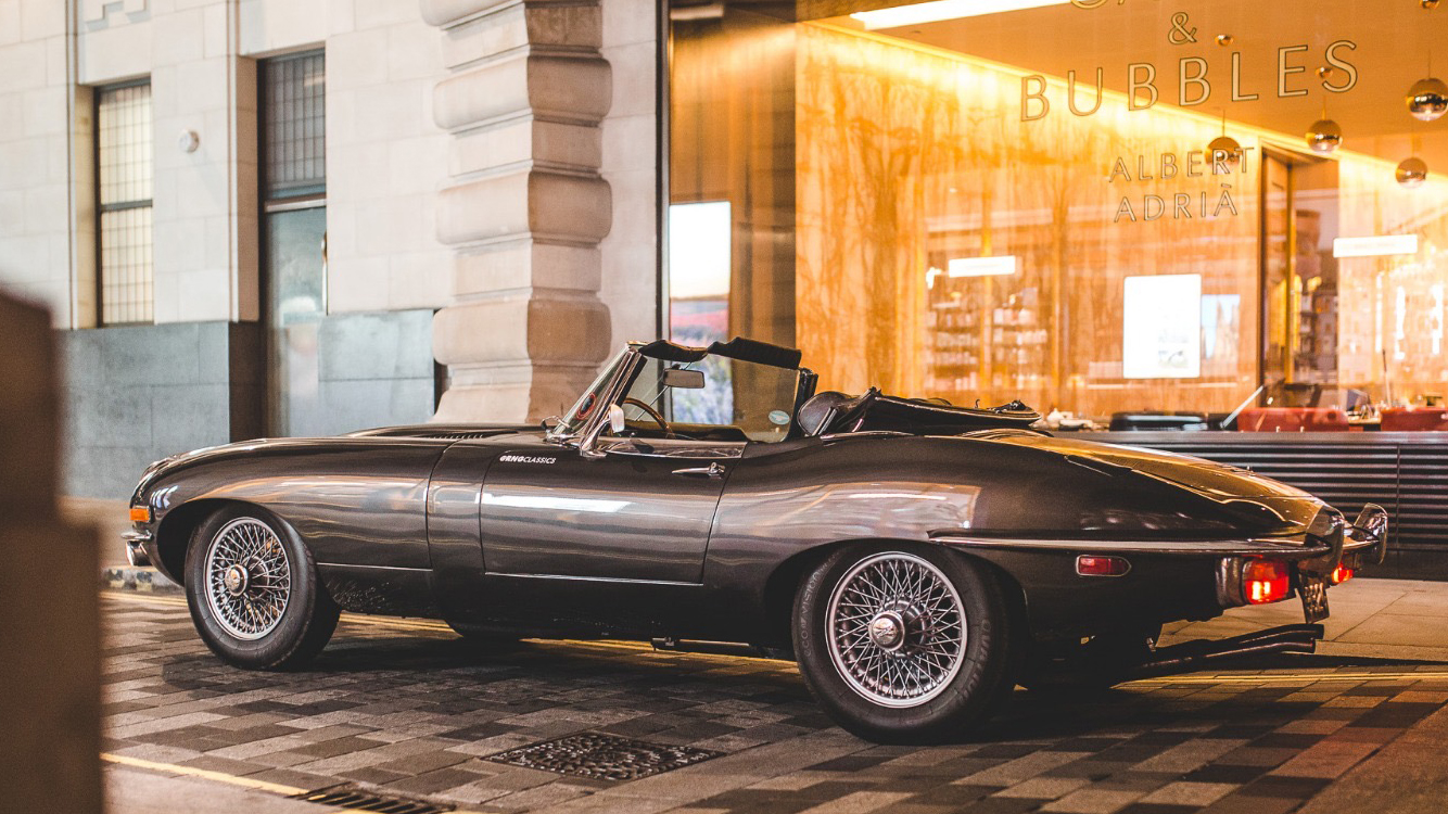 Classic Jaguar e-type parked in the street of London