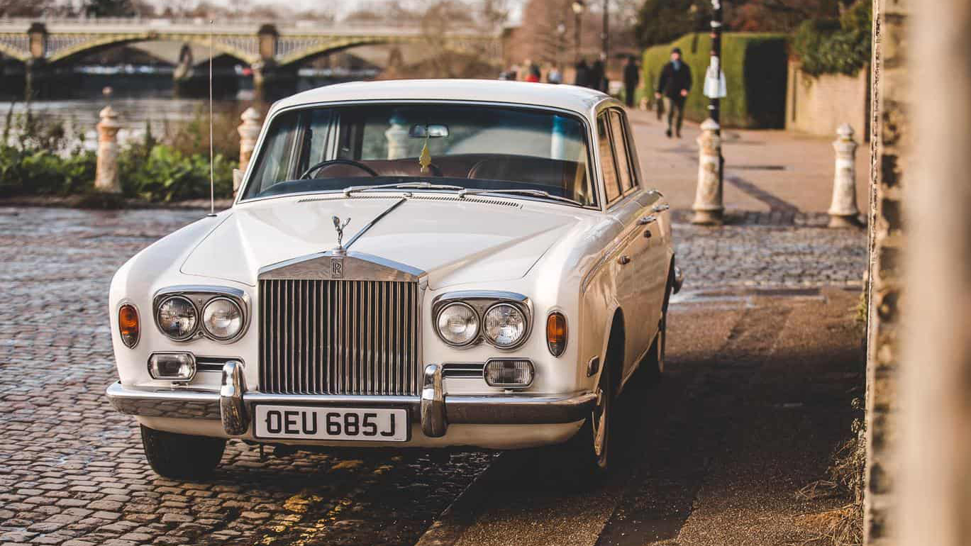 Classic rolls-Royce Silver Shadow in white parked in the street of London