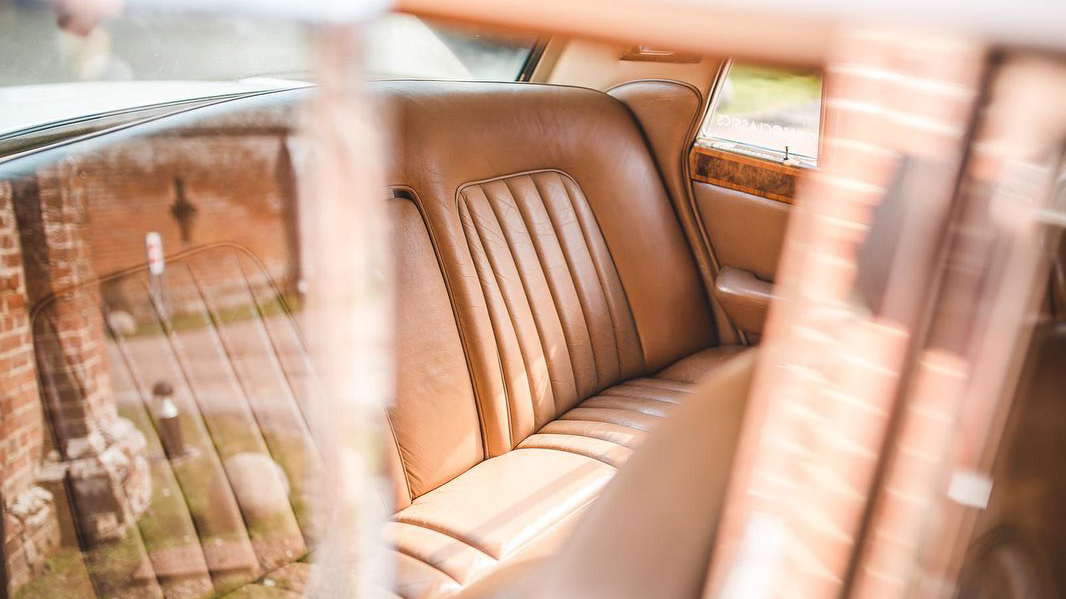 Rear interior cream leather seating inside Rolls-Royce Silver Shadow