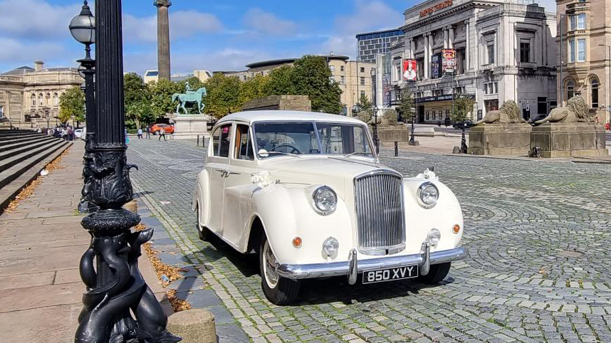 Front rioght view of classic limousine parked in the streetof Southport