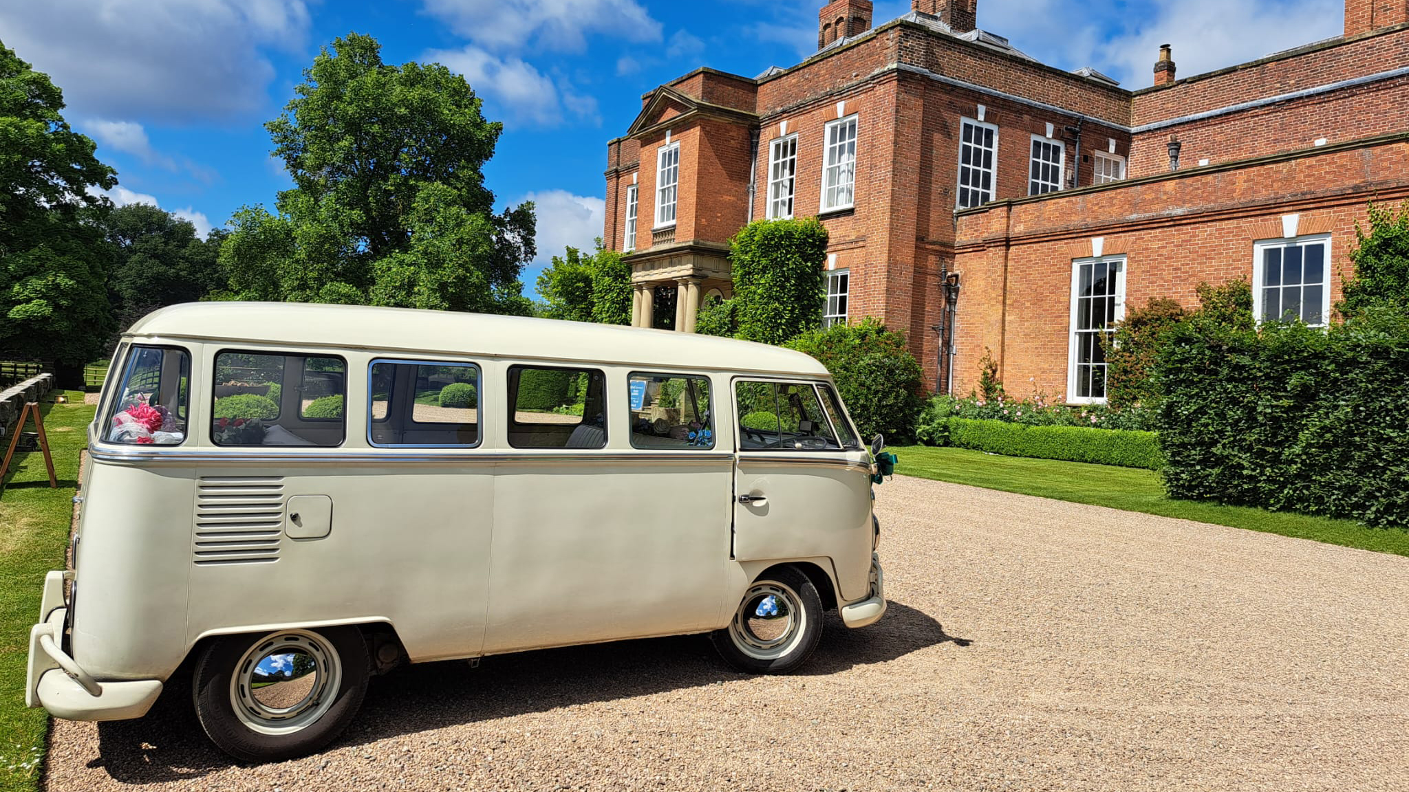 Classic VW Campervan parked in front of a wedding venue in Southport