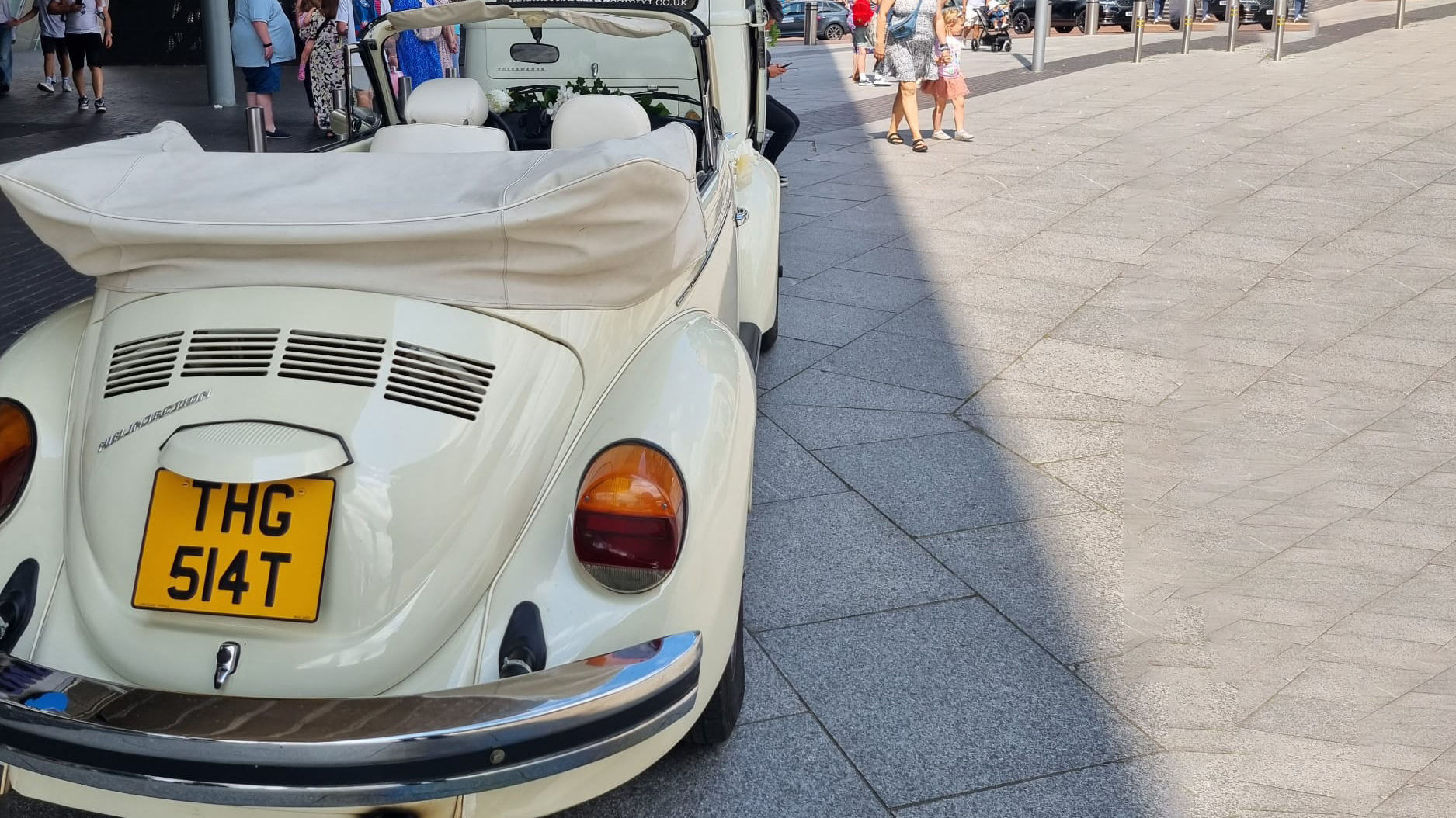 rear view of classic vw beetle in cream