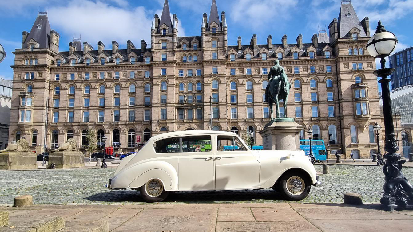 Right side view of classic Austin Princess Limousine in Ivory