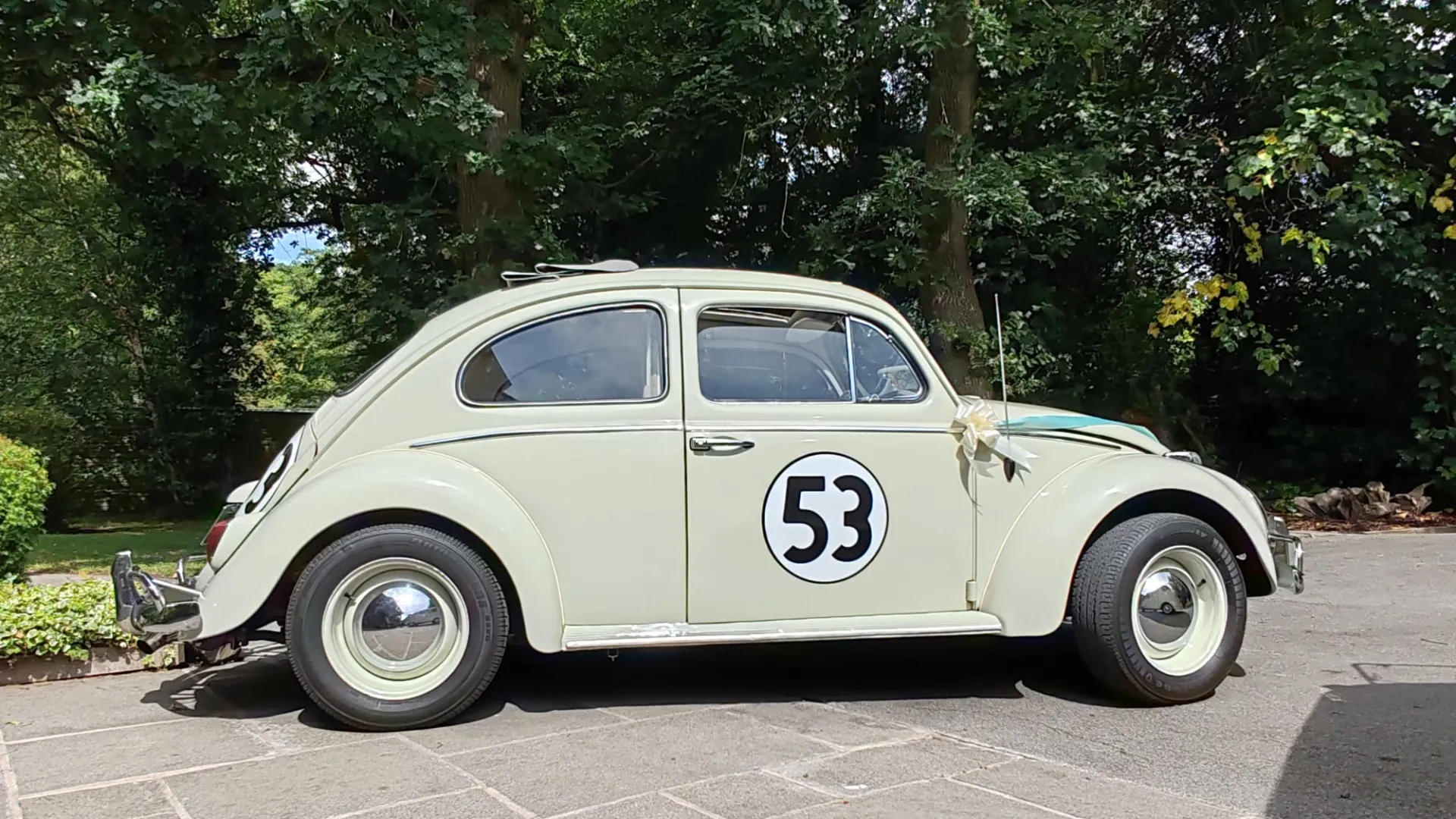 Right side view of "Herbie" the iconic VW beetle with number 53 on its door