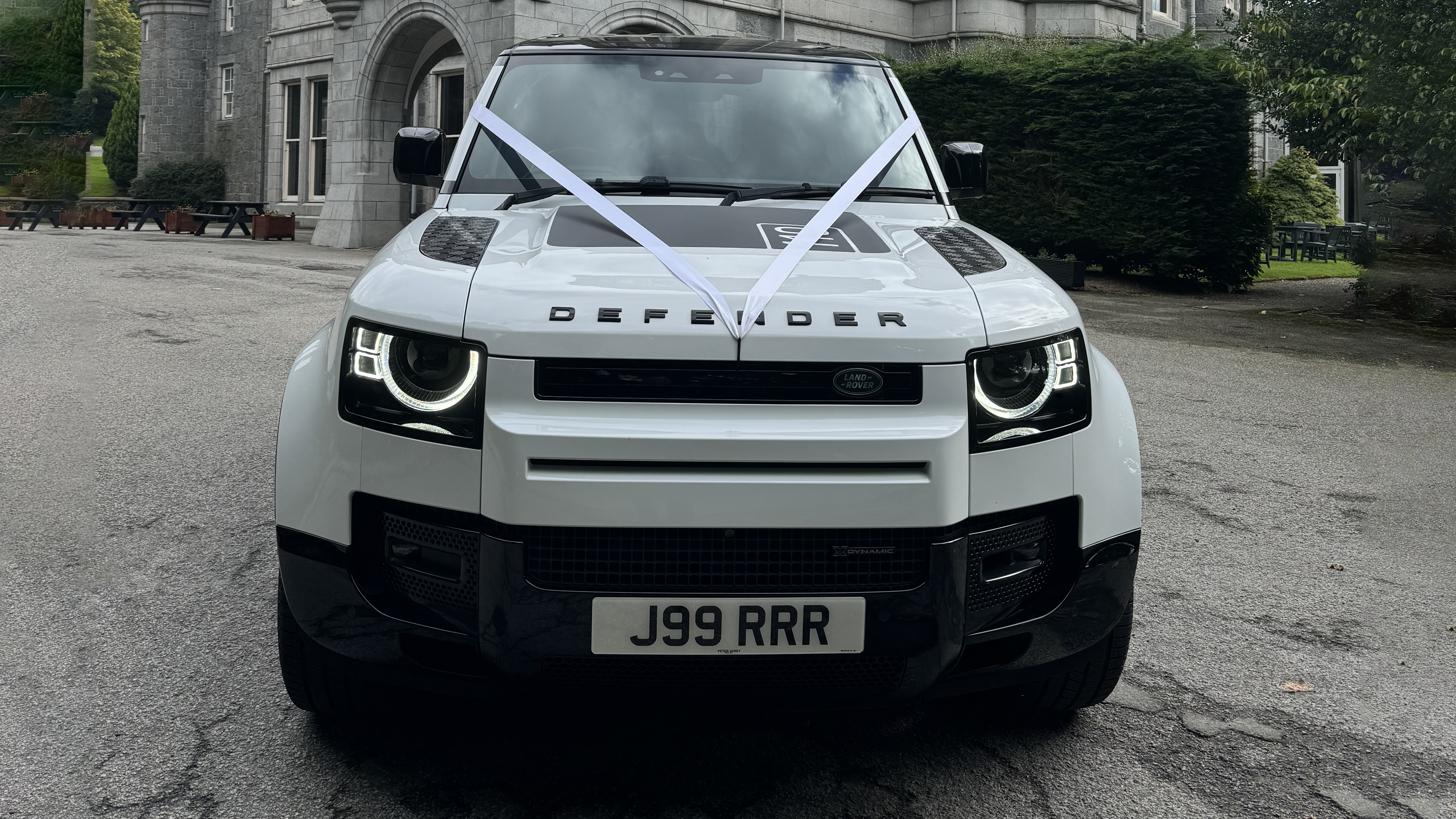 Full Front View of white land rover defender