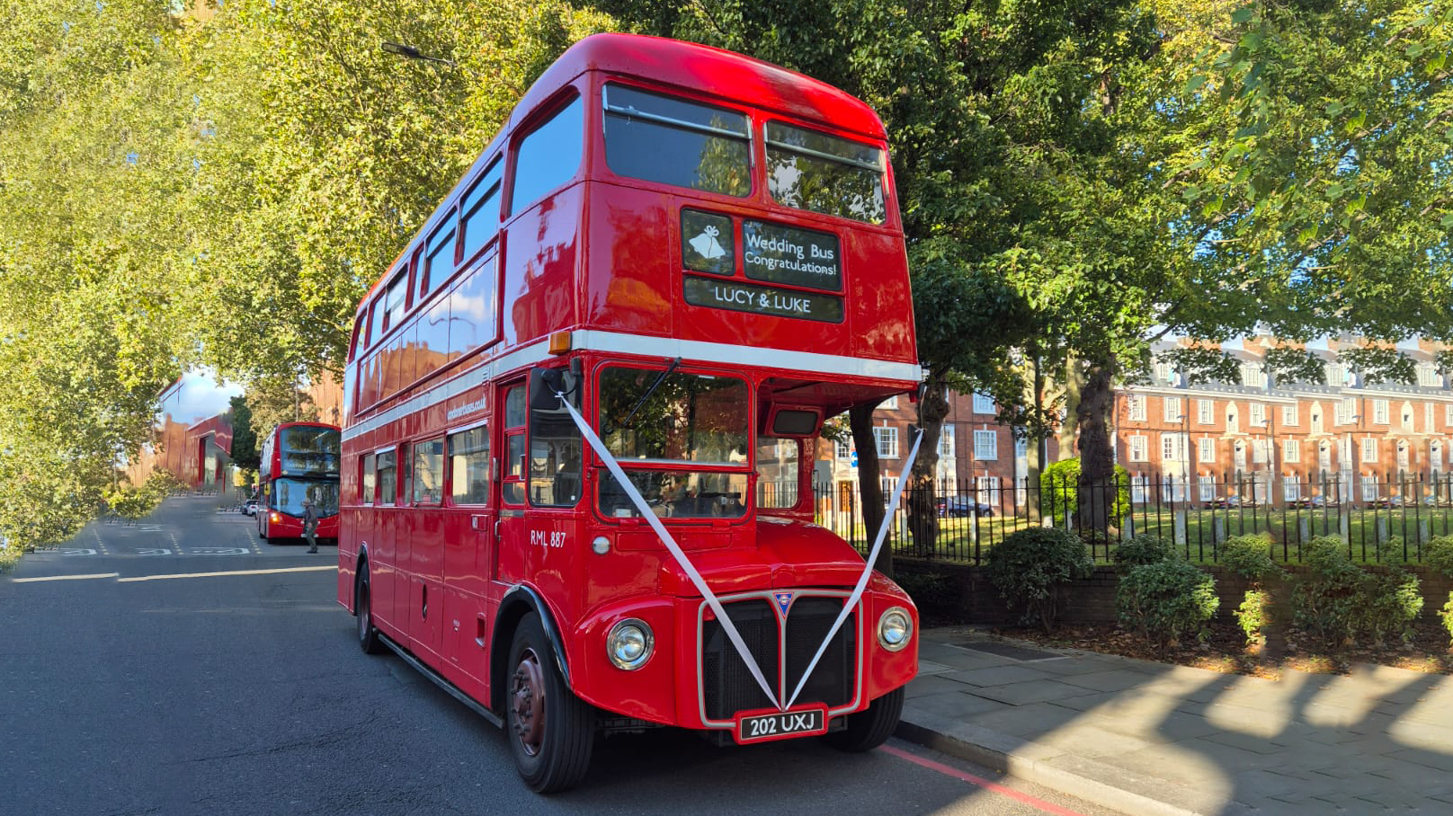 Double Decker Red Routemaster Bus parked in the street of London