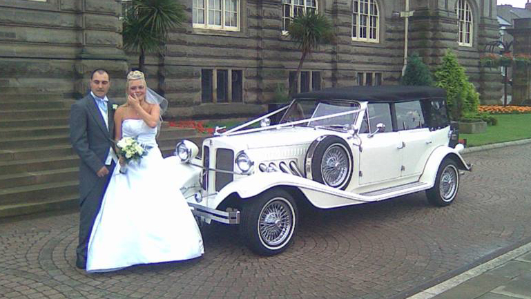 Beauford Convertible in Ivory with convertible black soft top roof closed