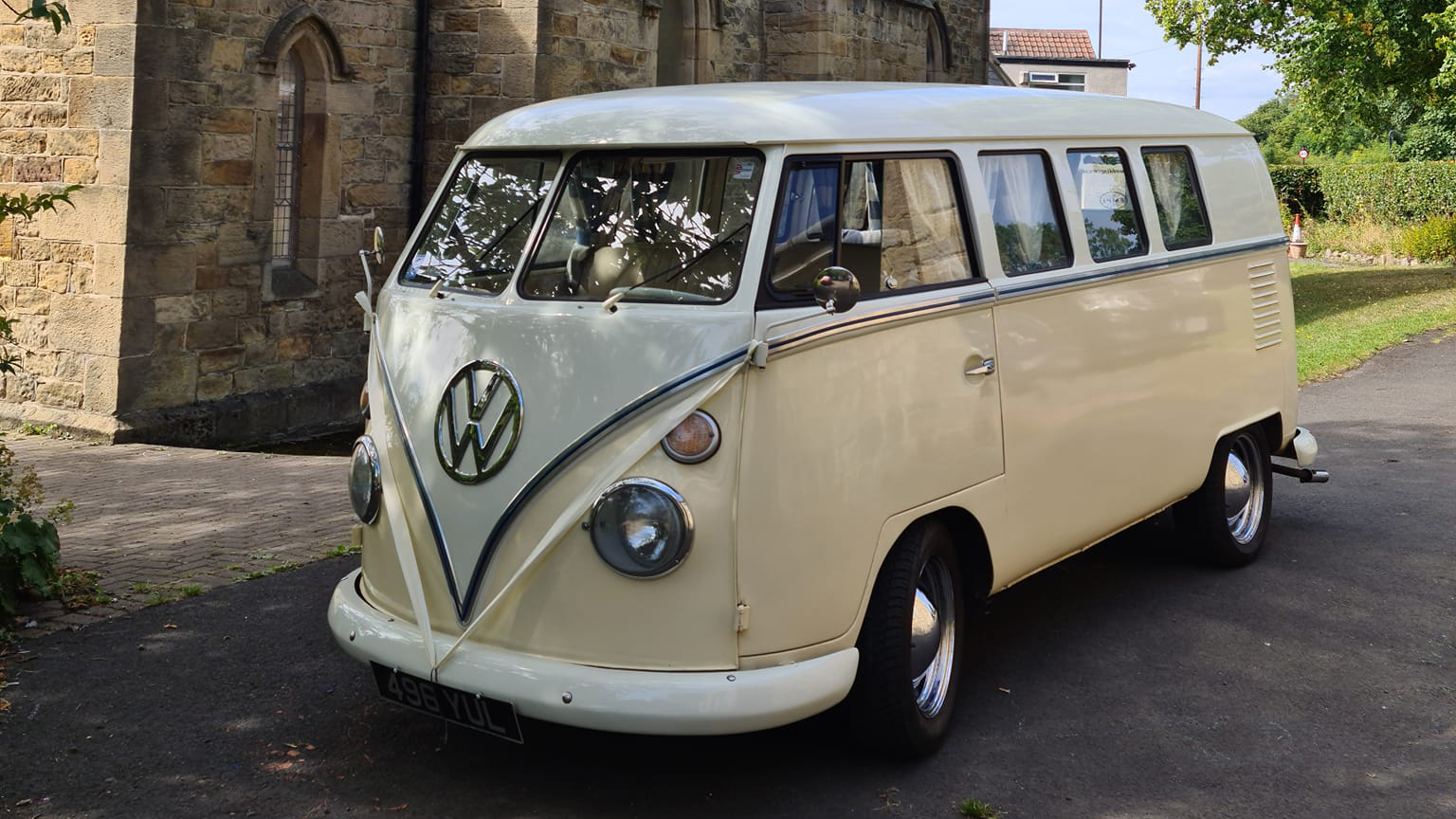 Classic VW Campervan in two tone colour white and Ivory decorated with White Ribbons