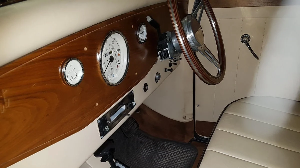 Vintage Regent front driver wooden sterring wheel and wooden dashboard.