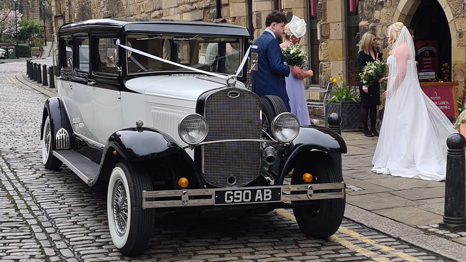 Front view of Bramwith Limousine with Bride and Groom