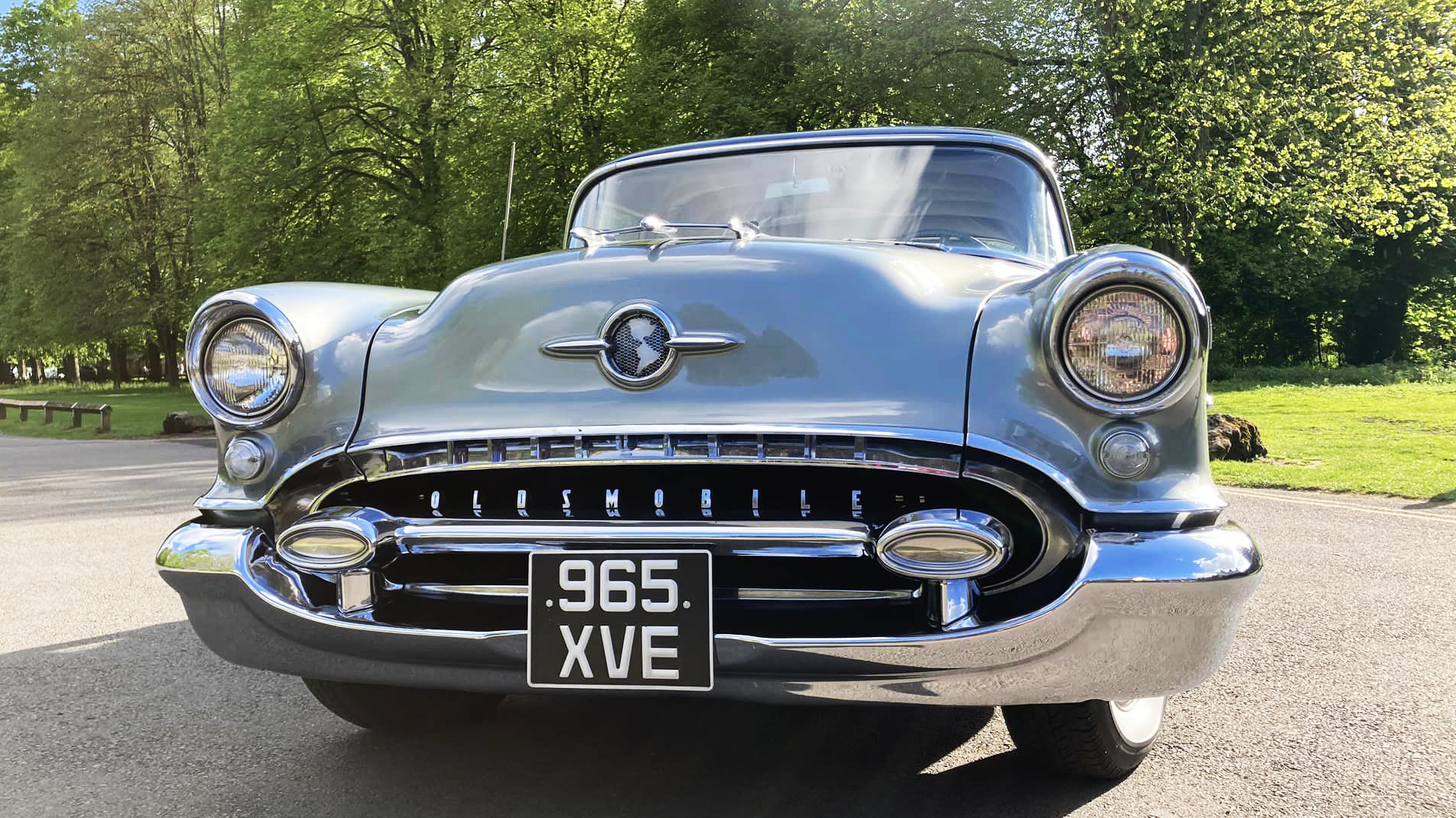 front view classic American Oldsmobile Rocket 88 with silver bonnet.