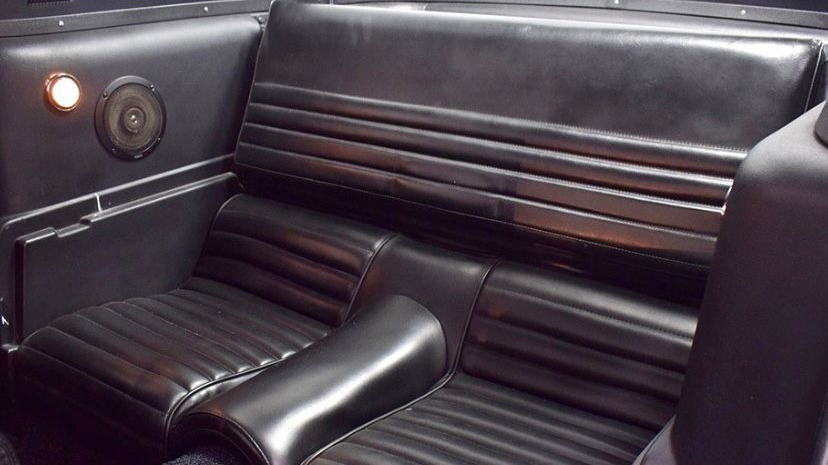 Black leather rear seats inside Classic Ford Mustang