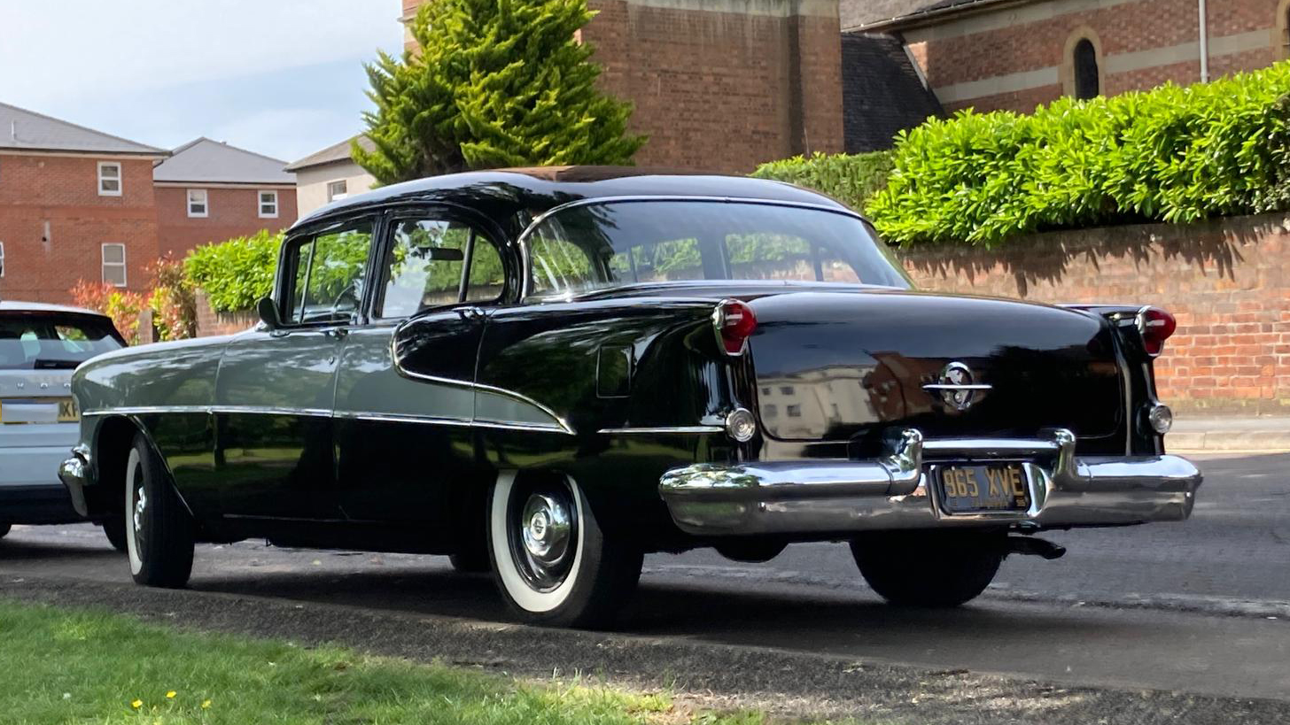 left rear side view of classic American Oldsmobile