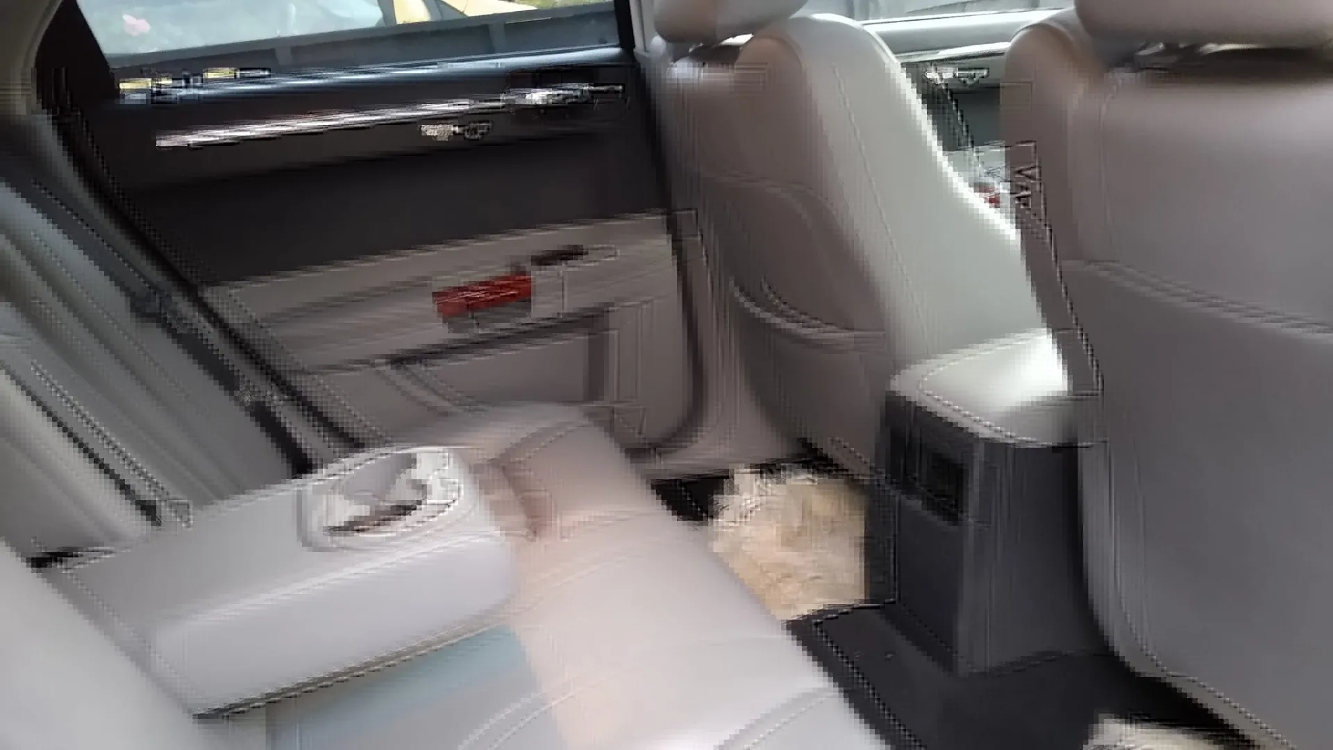 rear interior seating in Chrysler 300c saloon car with silver leather