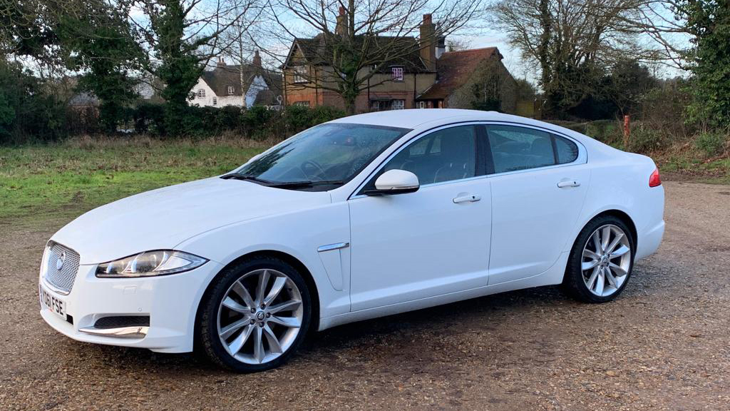 Modern White Jaguar XF