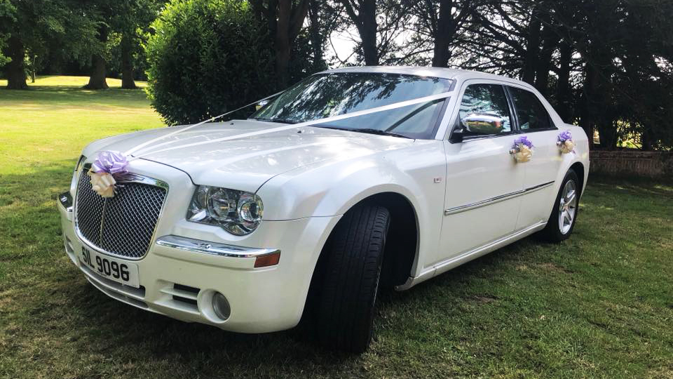 White Modern Chrysler 300c saloon car