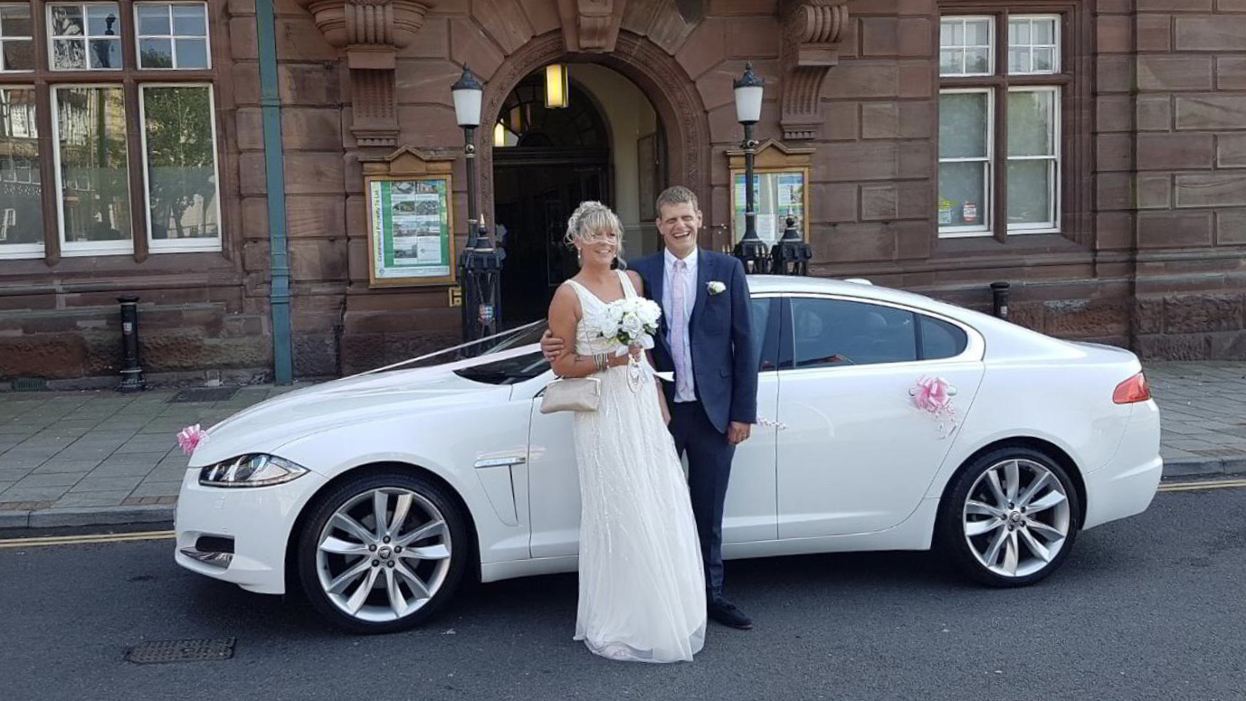 Modern White Jaguar XF