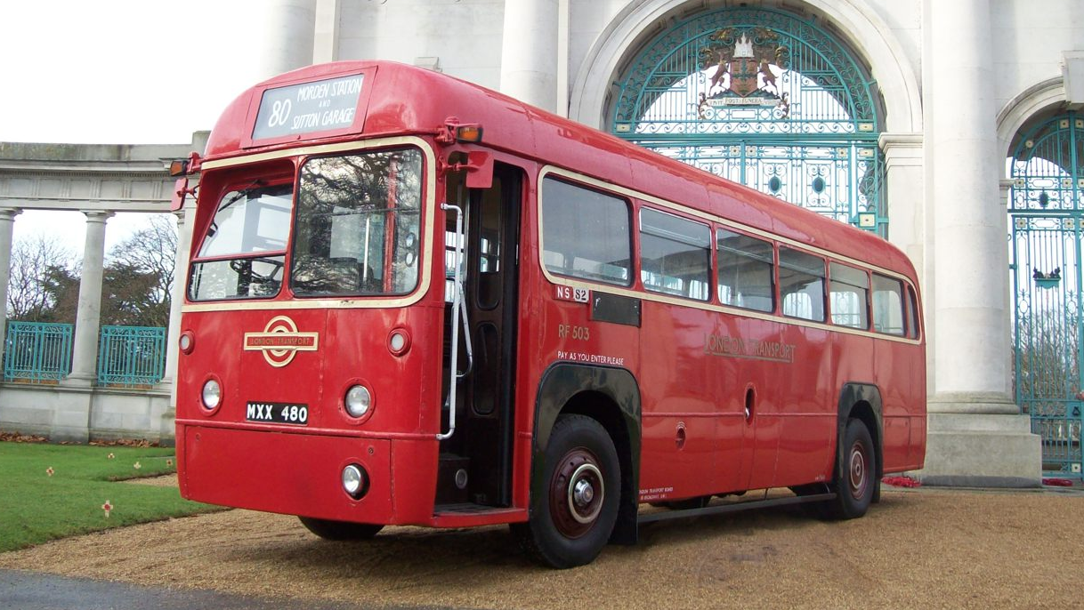 Vintage Single Decker Red Wedding Bus with front door open