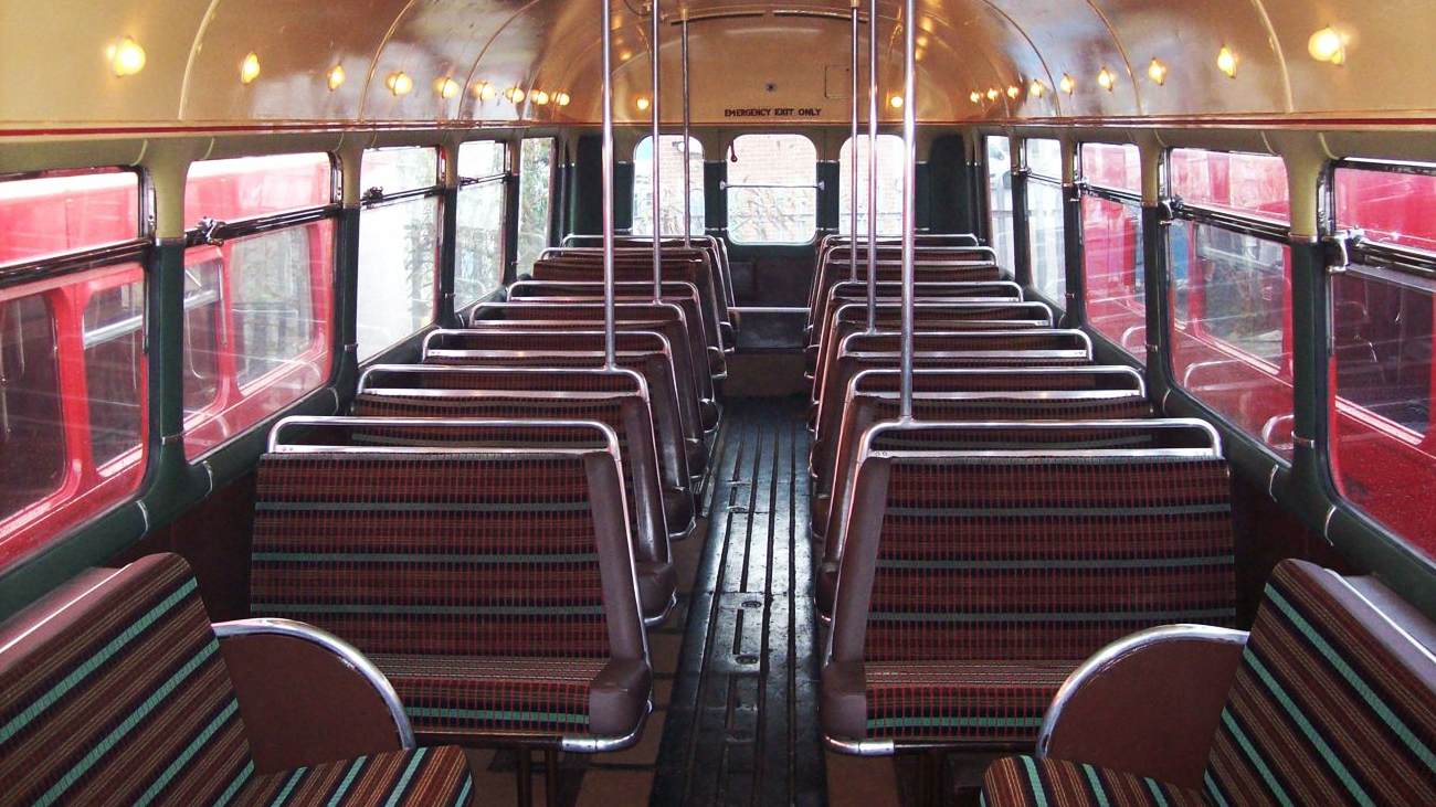 interior seating inside single decker red bus