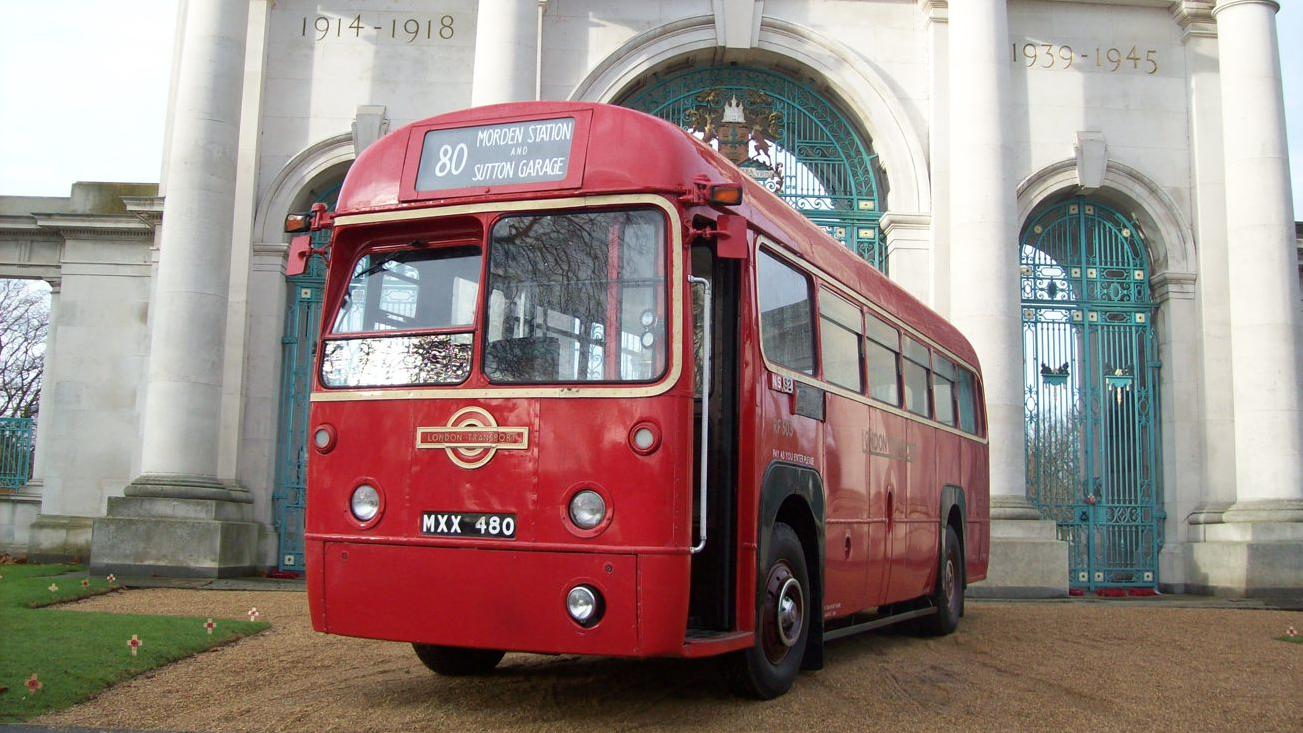 Front view Red Bus with front passenger door open