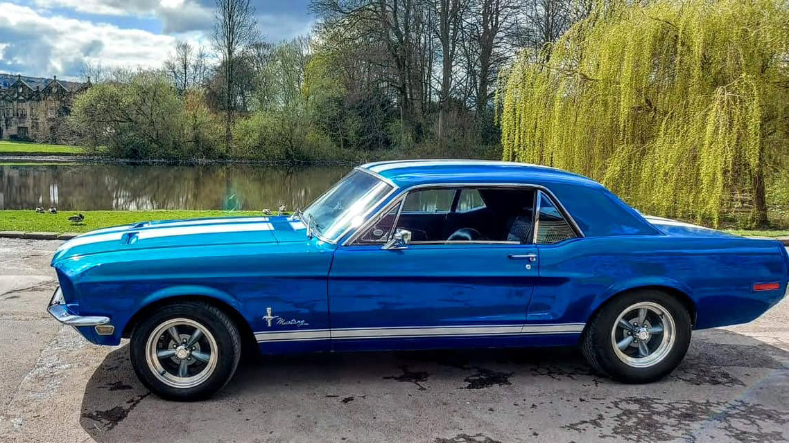 Left side view of Classic Ford Mustang in Blue