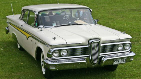 Classic Ford Edsel in Ivory with Yellow line on the side of the vehicle