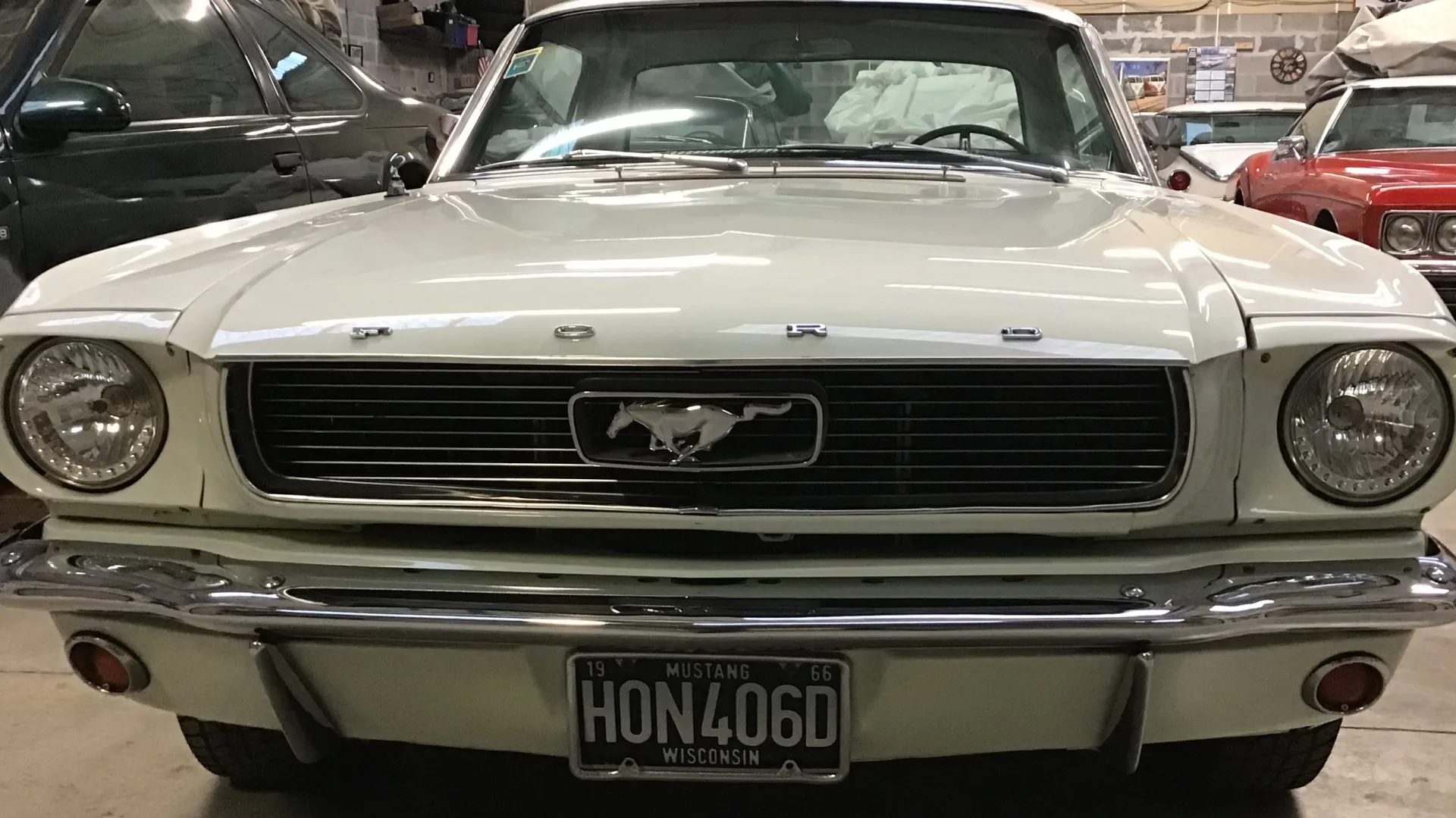 Close up of front Grill and chrome bumper of Classic Ford Mustang