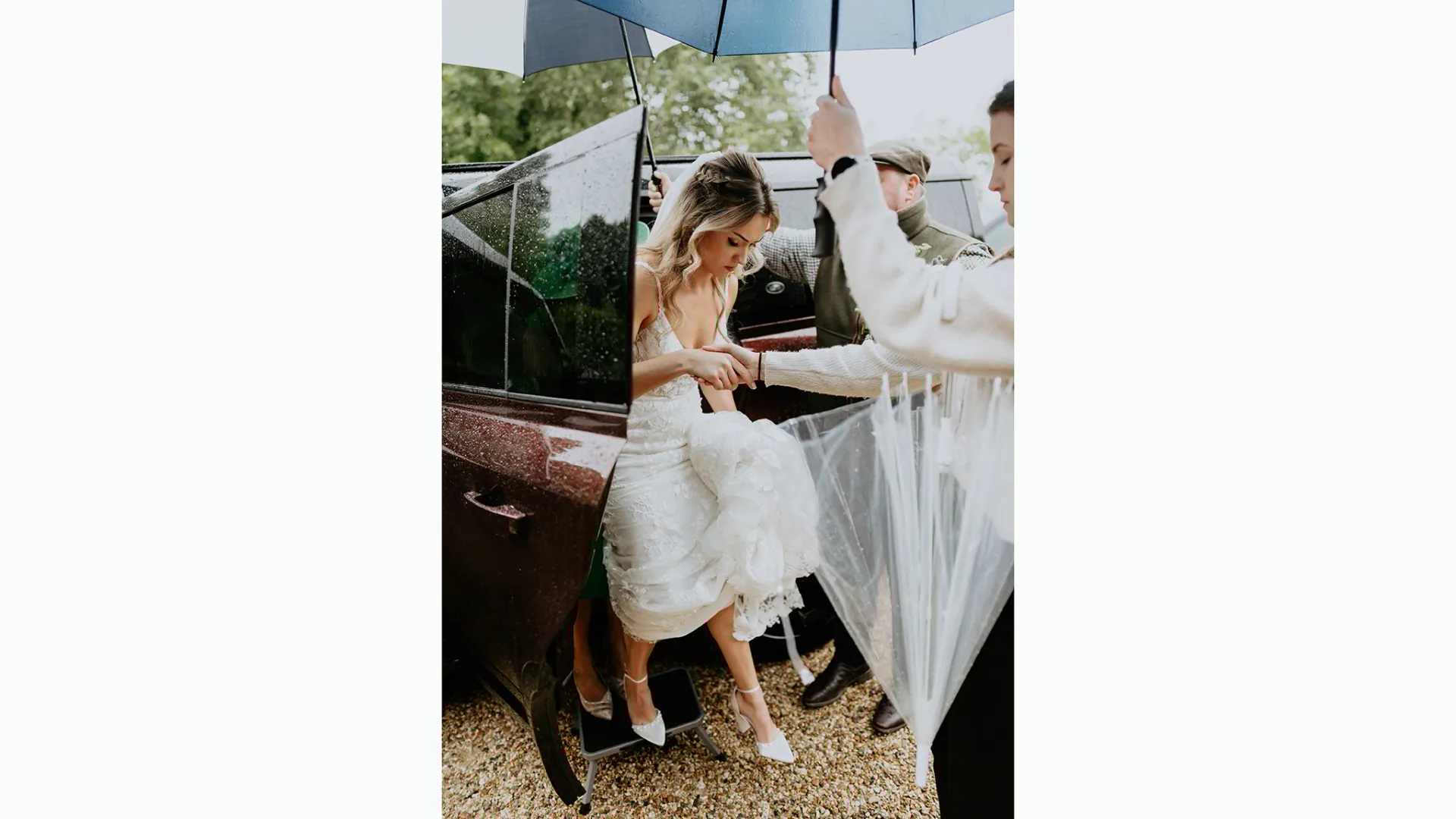 Bride exiting the rear of a Modern Landrover Defender