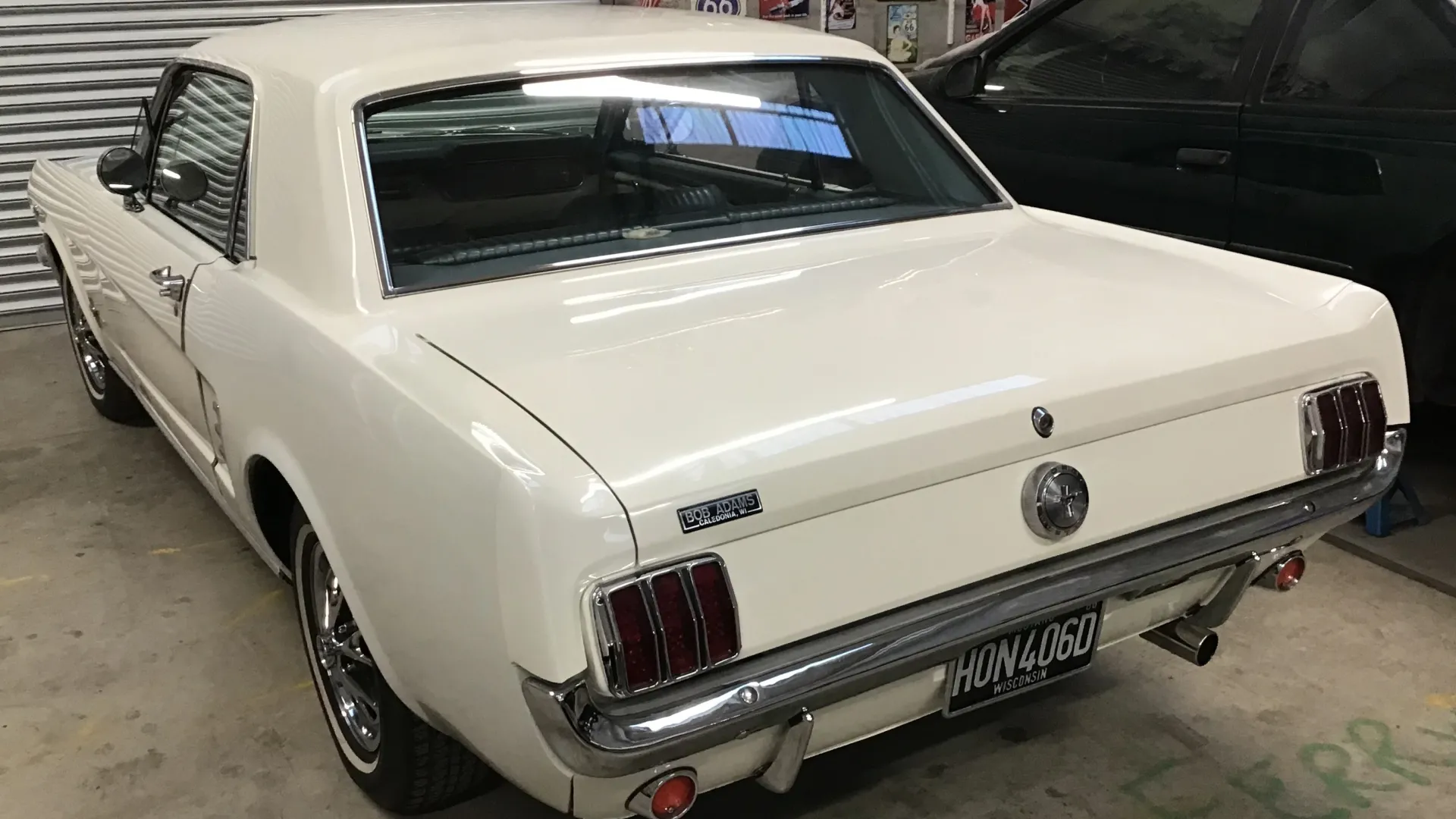 Rear view of Classic White Mustang