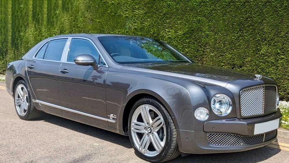 Grey Bentley Mulsanne with large alloy wheels finished in chrome