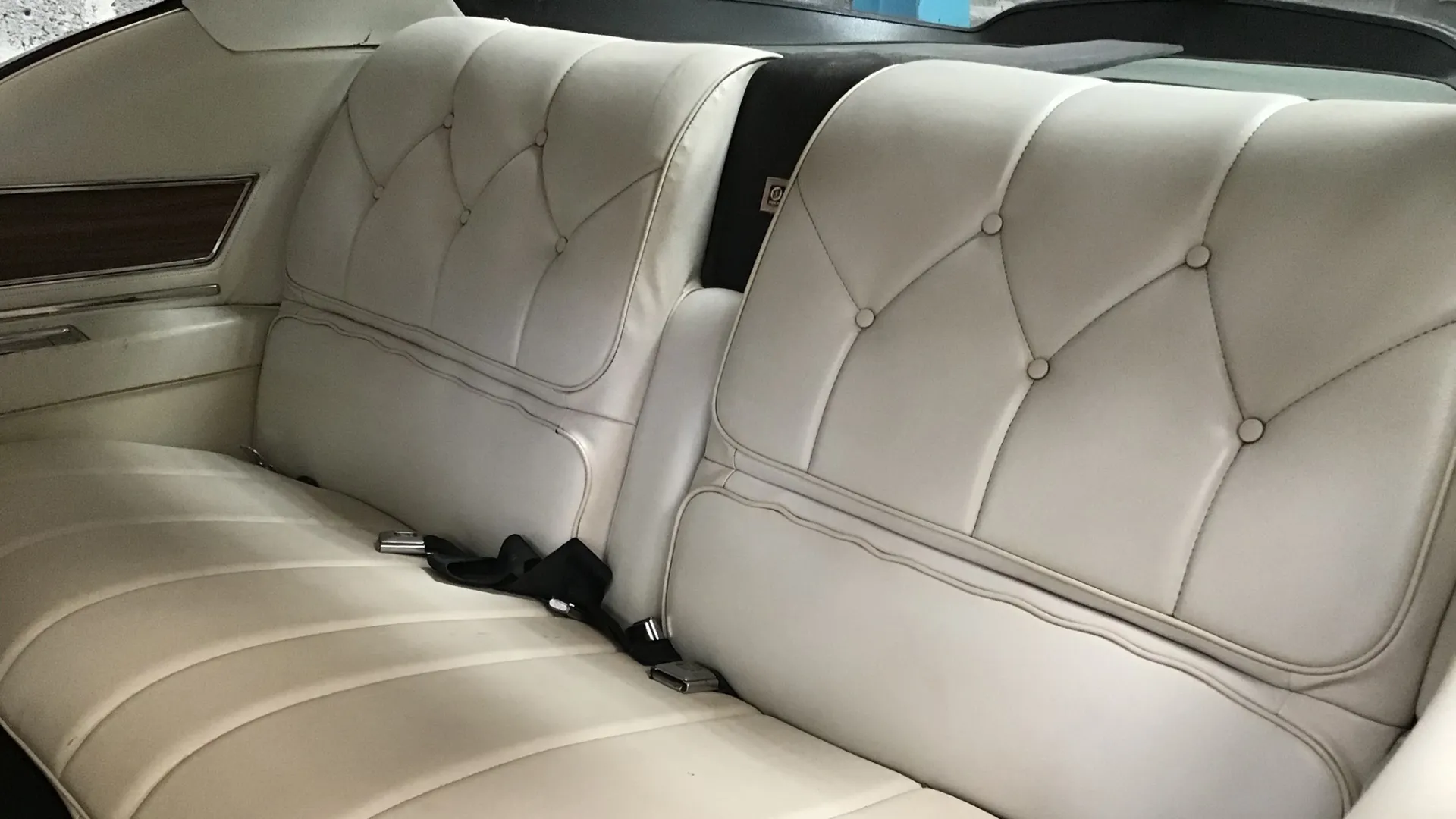 Cream leather seats inside classic american Buick