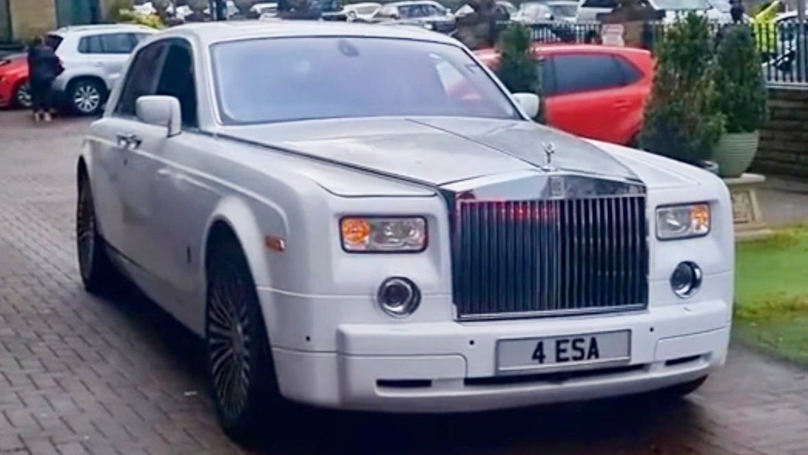 Modern Rolls-Ropyce Phantom in White with Silver bonnet parked in Bradford