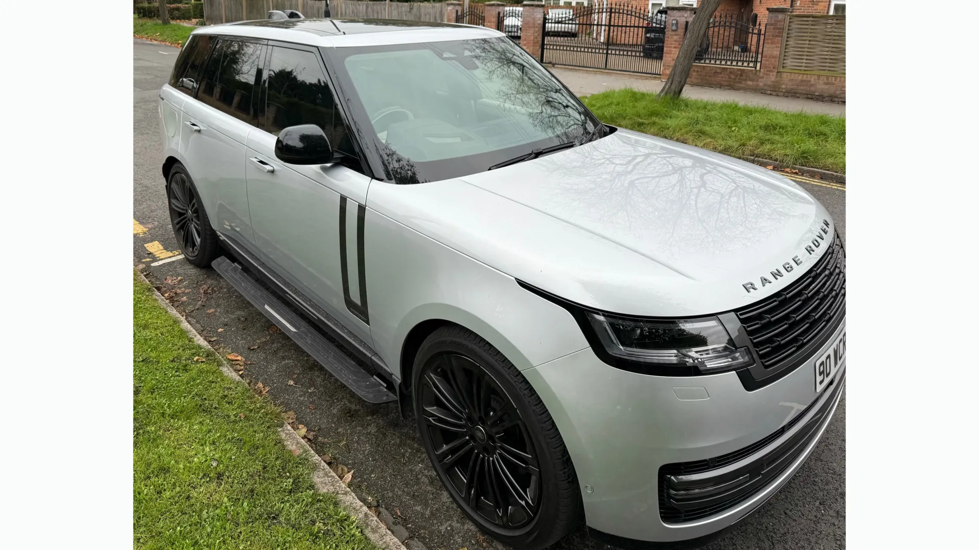 Modern Silver Range Rover with large black alloy wheels