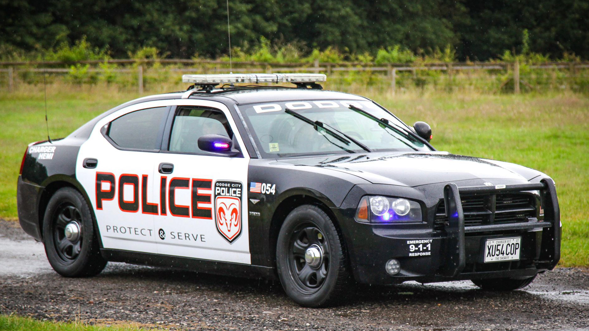 Modern American Police Car in Black & White with police sign